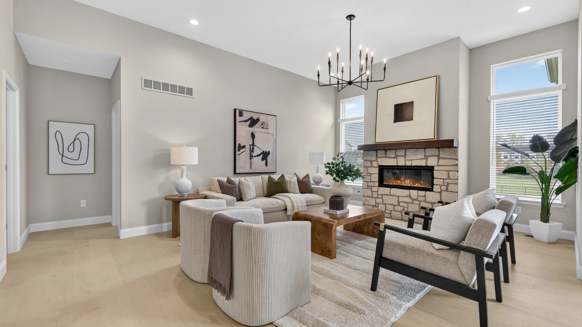 McKelvey Homes great room with fireplace and open ceilings